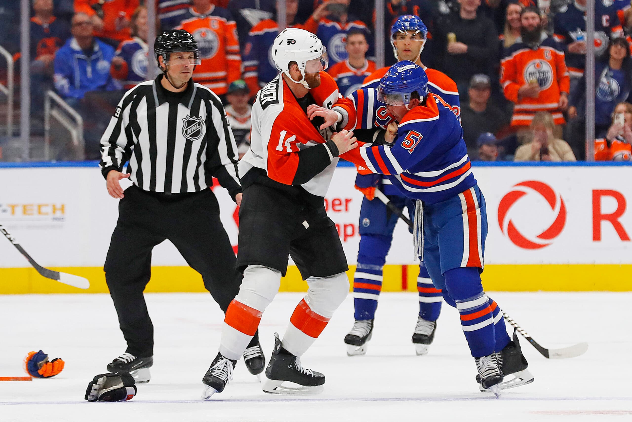 Edmonton Oilers Troy Stecher fights Sean Couturier