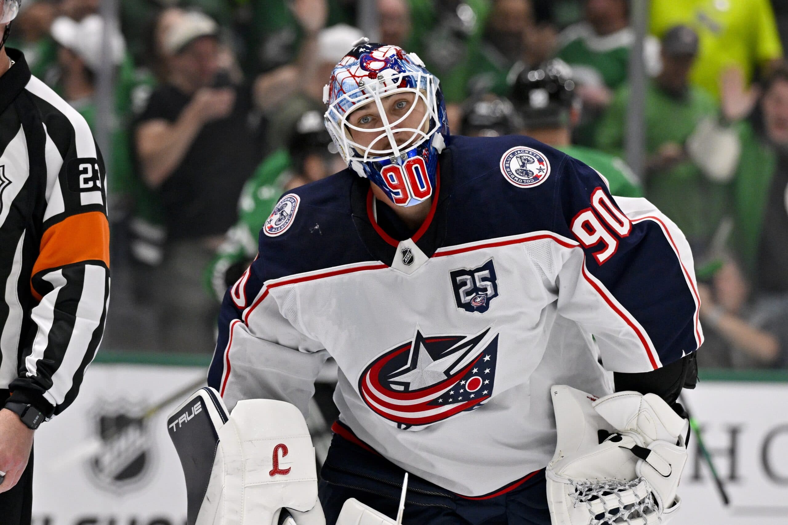 Columbus Blue Jackets goaltender Elvis Merzlikins (90) reacts to giving up a goal to Dallas Stars center Tyler Seguin (91) during the second period at the American Airlines Center.